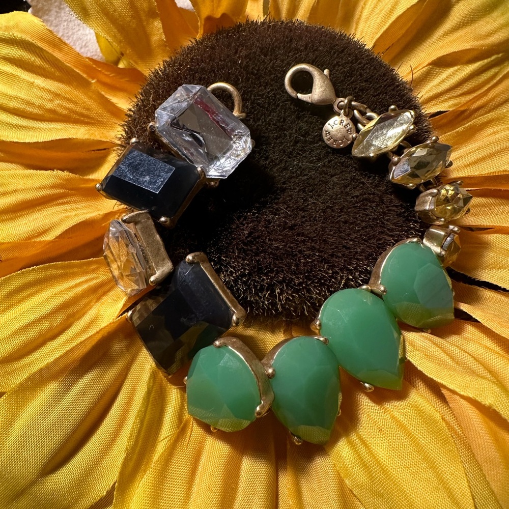J Crew gold tone green, gray and clear rhinestone bracelet.